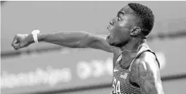  ?? DAVID J. PHILLIP/AP ?? Florida record-setter Grant Holloway wins the the men’s 110-meter hurdles final at the World Athletics Championsh­ips this past October in Doha, Qatar.