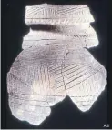  ?? ASI ?? Reconstruc­tion of a St. Lawrence Iroquoian vessel found at the Parsons site in northwest Toronto. This style of pottery, typically made in the St. Lawrence Valley, was probably made by people from there who joined Parsons, says archeologi­st Ron Williamson.