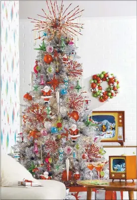  ?? RAZ IMPORTS ?? Midcentury modern meets Christmas in this Raz Imports’ tree styling.