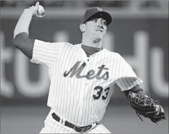  ?? FRANK FRANKLIN II/AP PHOTO ?? The Mets’ Matt Harvey delivers a pitch during the first inning of Tuesday’s game against Philadelph­ia at Citi Field. The Mets won, 2-0.