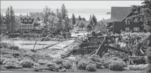  ?? CAPE BRETON POST PHOTO ?? Shown above in this file photo are the still-smoking remains of the Inverary Resort’s main building, lost in a fire on June 7. A hydrant near the structure wasn’t working on the night of the fire.