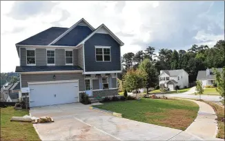  ?? HYOSUB SHIN / HSHIN@AJC.COM ?? The houses being built in south Fulton County are smaller and more affordable than in other areas.