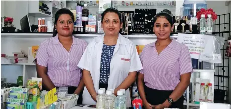  ?? Photo: Susana Hirst-Tuilau ?? Rineesha Mahadeo (middle) pose with her staff at her ICare Pharmacy in Rakiraki.