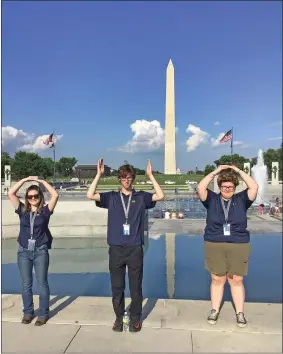  ?? SUBMITTED ?? Kaylie Blank (North Ridgeville), left, Kevin Daviduk (Amherst), and Haylei Ready (Elyria) show their Ohio pride at the Washington Monument.