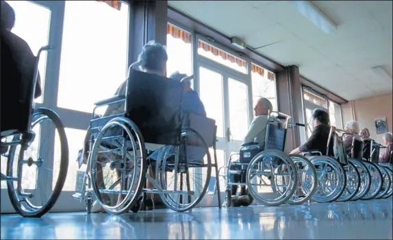  ?? PATRICK LANDMANN/GETTY ?? During the coronaviru­s pandemic, nursing home residents have suffered disproport­ionately, accounting for nearly 40 percent of all COVID-19 deaths nationwide and 50 percent of COVID-19 deaths in Indiana nursing facilities.