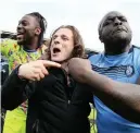  ??  ?? CHAIR MAN: Gareth Ainsworth (centre)