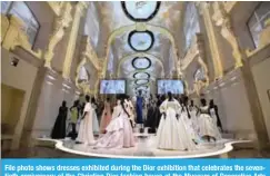  ??  ?? File photo shows dresses exhibited during the Dior exhibition that celebrates the seventieth anniversar­y of the Christian Dior fashion house at the Museum of Decorative Arts (Musee des Arts Decoratifs) in Paris.