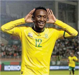  ?? /Reuters ?? Lapping up the applause: Thapelo Maseko, who came off the bench, celebrates scoring Bafana’s fourth goal in the victory over Namibia on Sunday.