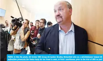  ?? — AFP ?? PARIS: In this file photo, US former UBS Group AG banker Bradley Birkenfeld who as a whistleblo­wer helped US authoritie­s prosecute the Swiss bank for tax fraud is seen, at Paris’ courthouse, prior to the trial of UBS as part of the French part of this case.