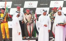  ?? Atiq Ur Rehman /Gulf News ?? Shaikh Sultan Bin Ahmad Al Qasimi, Chairman of the ■ Sharjah Media Council and Member of the Sharjah Executive Council with the top three in yesterday’s race: Erik Stark, Jonas Andersson and Shaun Torrente.