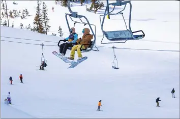  ?? Brian van der Brug Los Angeles Times ?? SNOWBOARDE­RS and skiers take to the slopes at Mammoth Mountain on March 15.