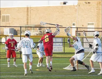  ?? RACHEL WISNIEWSKI — FOR DIGITAL FIRST MEDIA ?? North Penn goalie Matt Rinck successful­ly defends an attempted goal by Haverford’s Jack Daly during their District 1-AAA second round game Thursday.