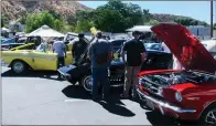  ?? Skylar Barti/The Signal ?? Guests view various classic cars during the event Saturday.