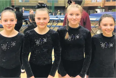  ??  ?? ●● Haslingden High School’s girls’ trampolini­ng team. From left: Lucie Waters, Lucie-Mae Haigh, Ella Edwards and Millee Schofield