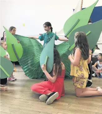  ??  ?? Young people go over their scripts and rehearse for their shows at previous Fest! summer camps