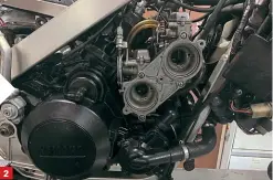  ??  ?? 2 1/ The carburetto­rs were bad, but not sad. A full strip, soak and blow-out, re-set and they were as good as new. 2/ Once back on the bike it was time to start routing the many cables. Ensuring the carby clamps are in the correct position is critical as once the air-box is on there is only one point you can access the clamp screws.