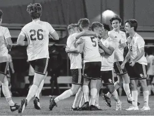  ?? Jessica Phelps / Staff photograph­er ?? Clemens celebrates a goal scored by Hayden Sharp early in the second half. The Buffaloes outshot Johnson 18-5 for the game and only allowed one shot in the second half.