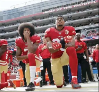  ?? MARCIO JOSE SANCHEZ — THE ASSOCIATED PRESS FILE ?? San Francisco safety Eric Reid, right, shown kneeling with former quarterbac­k Colin Kaepernick during the national anthem before a game against the Dallas Cowboys last season, said his Christian faith is the reason why he joined Kaepernick’s protest...