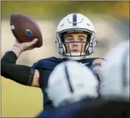  ?? THE ASSOCIATED PRESS ?? Penn State quarterbac­k Trace McSorley throws during practice, Wednesday, in State College.