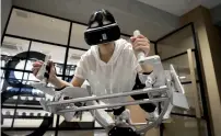  ?? Bloomberg ?? The Icaros virtual reality fitness machine at a personal training gym in Tokyo. —