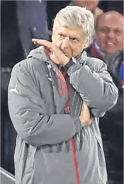  ?? Picture: Getty. ?? Disconsola­te Arsenal boss Arsene Wenger endures last night’s 3-0 defeat at Selhurst Park.