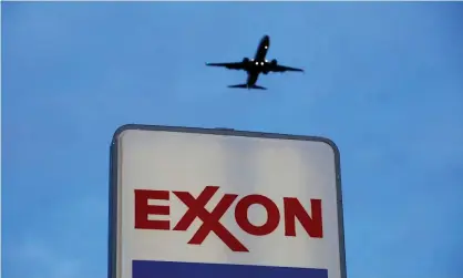  ?? Photograph: Jim Young/Reuters ?? Exxon and Chevron discussion­s in 2020 were described as preliminar­y, but are not said to be ongoing.