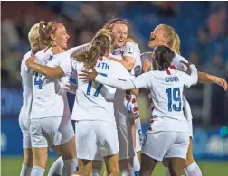  ??  ?? The United States’ Becky Sauerbrunn (4), Julie Ertz (8), Rose Lavelle (16), Tobin Heath (17), Abby Dahlkemper (7), Becky Sauerbrunn (4) and Crystal Dunn (19) celebrate after a goal vs. Canada on Wednesday.