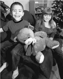  ?? JULIO CORTEZ/ THE ASSOCIATED PRESS ?? McKenna Pope, 13, right, thinks Easy Bake Ovens should be marketed for boys like her brother Gavyn Boscio, 4.