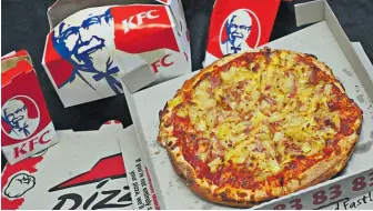  ?? Photo / Brett Phibbs ?? Restaurant Brands, which owns KFC and Pizza Hut in New Zealand, led the market higher, up 2.8 per cent at $8.84 on very light volume.