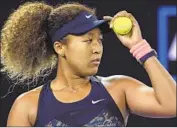  ?? Andy Brownbill Associated Press ?? NAOMI OSAKA “is taking some personal time with friends and family,” according to a statement.