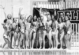  ?? COURTESY ?? Lake Nona High School’s girls water polo team celebrates its 2021 FHSAA state championsh­ip in Miami.