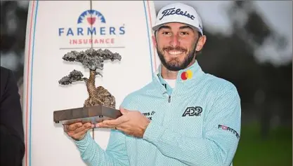  ?? Orlando Ramirez / Getty Images ?? Max Homa, a Southern California native, came from five shots down to win the Farmers Insurance Open on the South Course of Torrey Pines Golf Course in La Jolla, Calif. He shot a round of 66 on Saturday.