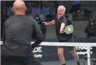  ?? JIM RASSOL/USA TODAY SPORTS ?? John McEnroe returns a volley during Pickleball Slam 2.