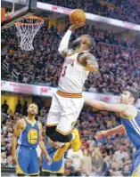  ?? THE ASSOCIATED PRESS ?? Cleveland’s LeBron James shoots Friday during Game 4 of the NBA Finals. The Cavaliers won 137116, reducing their series deficit to two games.