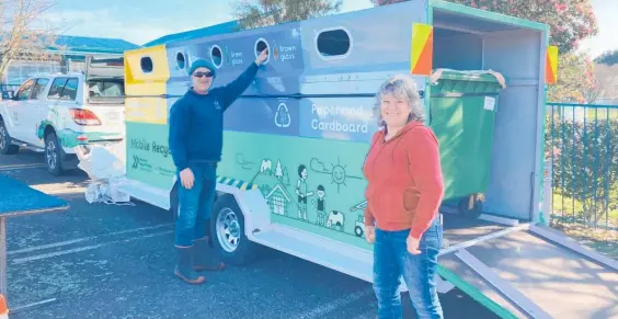  ?? Photo / Western Bay of Plenty District Council ?? Rural Western Bay of Plenty residents check out one of the mobile recycling trailers due to be rolled out in the area.