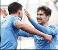  ??  ?? HEART OF CITY DEFENCE John Stones (right) and Ruben Dias