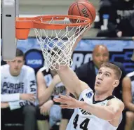  ?? MARK HOFFMAN / MILWAUKEE JOURNAL SENTINEL ?? Purdue 7-foot-2-inch center Isaac Haas has averaged one foul every 9.39 minutes this season.