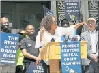  ?? LAURA A. ODA — STAFF PHOTOGRAPH­ER ?? Venus Zuhura Noble, a social worker with Alameda County, speaks about her many clients that cannot afford to live in the city they work in because of housing costs at Frank Ogawa Plaza in Oakland on Monday.