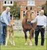  ??  ?? ‘BEACON OF HOPE’: Tullis Matson with the foal and Dr Gareth Starbuck with Ruby.