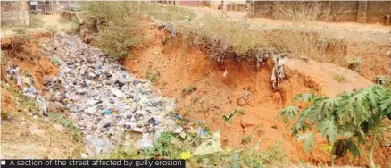  ??  ?? A section of the street affected by gully erosion