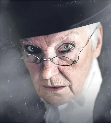  ??  ?? Ann Louise Ross as Ebenezer Scrooge.