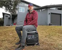  ?? Kin Man Hui / Staff photograph­er ?? Evan Strong now has a gas-powered generator for any possible power outage. His generator is able to run a refrigerat­or, internet router and a space heater.