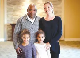  ??  ?? Tim Raines poses with his wife, Shannon, and 6- year- old daughters, Ava ( left) and Amelie, on Wednesday after being elected to the Hall of Fame.
| MATT YORK/ AP