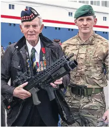  ??  ?? INSPECTION Gordon Highlander veteran James Glennie, 93