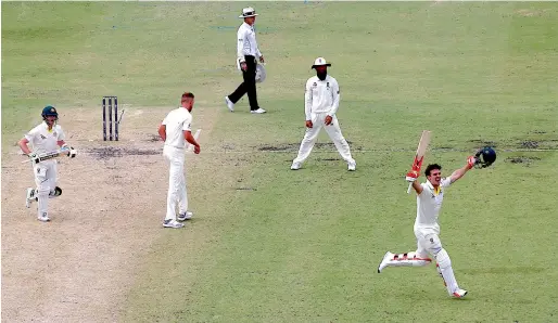  ?? Reuters ?? Australia’s Mitchell Marsh celebrates after reaching his century during the third day of the third Ashes Test. Smith’s men lead the five-match series 2-0. —