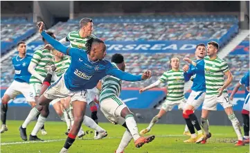  ??  ?? Celtic’s Callum Mcgregor (centre highest) scores an own goal to gift Rangers victory.