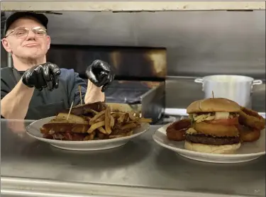  ?? PHOTOS BY MARAH MORRISON — THE NEWS-HERALD ?? With new leadership in the kitchen, Chagrin Tavern staff are looking toward a fresh start with a new menu.