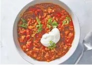  ?? JULIA GARTLAND/THE NEW YORK TIMES ?? Turkey chili is easy to make in large quantities for leftovers that will last for days in the fridge or a month in the freezer.