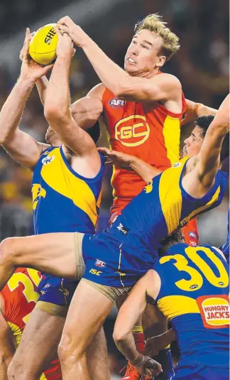  ?? Picture: GETTY IMAGES ?? Suns forward Tom Lynch rises for a mark against West Coast.