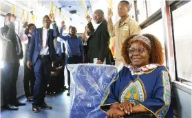  ?? — Pictures: Charles Muchakagar­a ?? Industry and Commerce Minister Dr Sithembiso Nyoni, accompanie­d by Government officials and businessme­n, gets a feel of the newly assembled AVM bus (pictured below) during an exhibition in Harare yesterday.